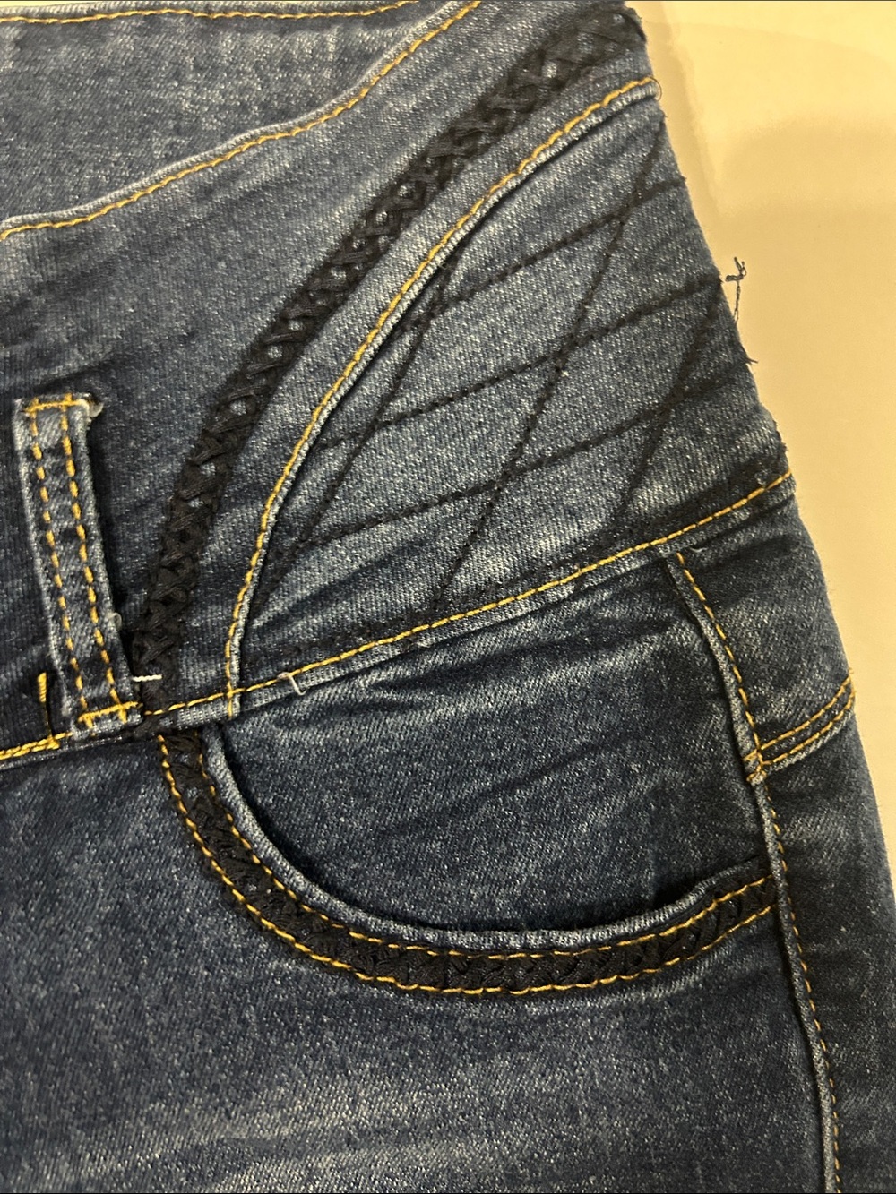 High-Rise Dark Blue Cropped Jeans with Quilted Waist Detail - Picture 4 of 9